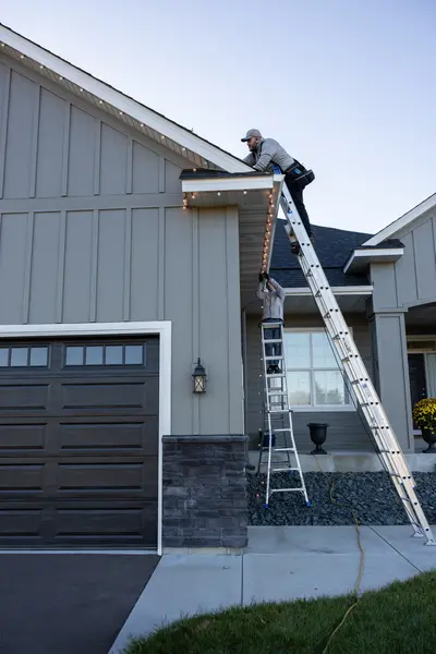 ultimate gutter solutions workers 400x600 2